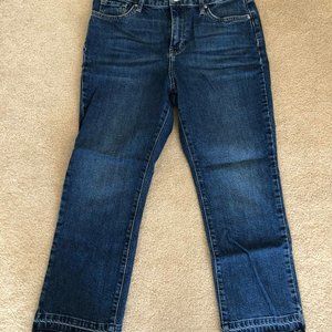 mid-rise medium wash jeans with fray hem